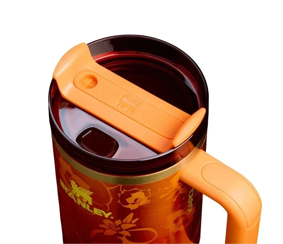 The Stanley 1913 x KAROL G 40 oz Quencher H2.O FlowState Tumbler